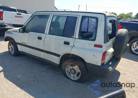 1996 Geo Tracker from USA, damaged, VIN 2CNBE1369T6943219